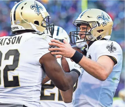  ?? TOMMY GILLIGAN/USA TODAY SPORTS ?? Benjamin Watson celebrates after catching Drew Brees’ 500th NFL TD pass Sunday.