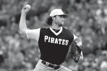  ?? Associated Press ?? n Pittsburgh Pirates starting pitcher Gerrit Cole throws during the first inning of a baseball game against the Cincinnati Reds on Saturday in Cincinnati.