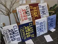  ?? BEN HASTY — MEDIANEWS GROUP ?? Some of the signs, made in school colors, to recognize the Class of 2020.