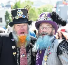  ??  ?? Plenty to enjoy . . . Brothers Alan (left) and James Bryan, of the Dunedin Steampunk Society, attend the market.