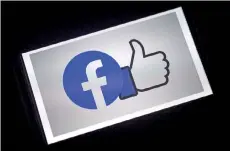  ?? — AFP file photo ?? A Facebook App logo displayed on a smartphone in Arlington, Virginia.