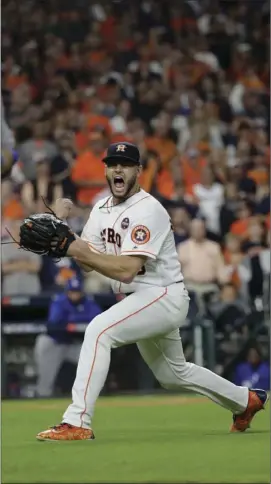  ??  ?? Houston Astros starting pitcher Lance McCullers Jr. reacts after getting Los Angeles Dodgers’ Justin Turner to ground out during the third inning of Game 3 of baseball’s World Series on Friday in Houston. AP PHOTO/DAVID J. PHILLIP