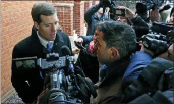  ?? GENE J. PUSKAR — THE ASSOCIATED PRESS ?? Conor Lamb, the Democratic candidate for the special election in Pennsylvan­ia’s 18th Congressio­nal District, talks with reporters after taking his grandmothe­r Barbara Lamb to vote in Carnegie, Pa., Tuesday.