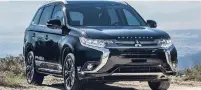  ??  ?? The Mitsubishi Outlander PHEV was named the Green SUV of the year by U.S.-based Green Car Journal.