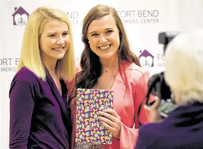  ?? Melissa Phillip / Staff photograph­er ?? Sydney Whigam, right, says Elizabeth Smart, left, has served as a beacon of hope for her as a sexual abuse survivor. Smart has been a national advocate after she was kidnapped at 14 and held in captivity in a case that gained national attention.