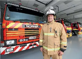  ?? PHOTO: SCOTT HAMMOND/FAIRFAX NZ ?? Deputy fire chief Tony Nolan with three of the Blenheim station’s new trucks, which will be on show on Sunday.