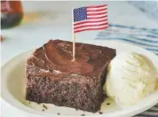  ?? PRNEWSFOTO/CRACKER BARREL OLD COUNTRY STORE ?? All 641 Cracker Barrel Old Country Store locations will offer veterans a compliment­ary piece of Double Chocolate Fudge Coca-Cola Cake for dessert on Friday, Nov. 11, to thank them for their service and sacrifice.