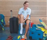  ??  ?? Bronte Campbell tries on her Games uniform from head to toe.