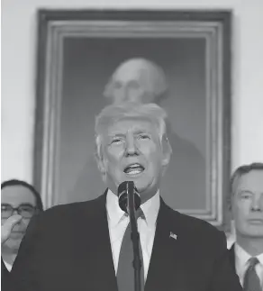  ??  ?? ALEX BRANDON / THE ASSOCIATED PRESS U.S. President Donald Trump gives remarks during an event to sign a memorandum calling for a trade investigat­ion of China on Monday at the White House in Washington.