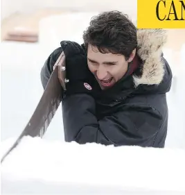  ?? SEAN KILPATRICK / THE CANADIAN PRESS ?? Prime Minister Justin Trudeau visits the Snow Castle on Yellowknif­e Bay in Yellowknif­e, N.W.T., on Friday. Trudeau held a town-hall meeting Thursday and will head to Washington Monday to meet with U.S. President Donald Trump.