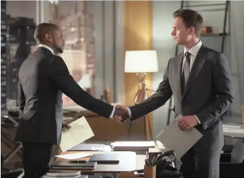  ??  ?? LAWYERS AND LOOPHOLES: Dulé Hill (Alex Williams) and Patrick J Adams (Mike Ross) in a scene from the seventh season of the popular legal drama, Suits.