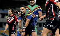  ?? ANTHONY AU-YEUNG/PHOTOSPORT ?? Te Toiroa Tahurioran­gi celebrates a try for the WaiCoa Bay Stallions rugby league team in the national premiershi­p in 2013.