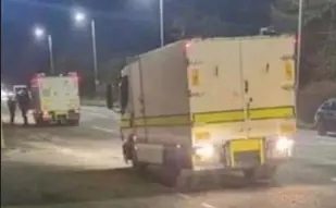  ??  ?? Drama: Bomb disposal teams at lorry park where device was found