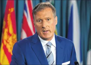  ?? CP PHOTO ?? Quebec MP Maxime Bernier announces he will leave the Conservati­ve party during a news conference in Ottawa, on Thursday.