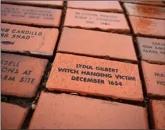  ?? (AP/Jessica Hill) ?? A brick memorializ­ing Lydia Gilbert is seen Jan. 24 in a town Heritage Bricks installati­on in Windsor, Conn. In 1651, an accident during a local militiamen training exercise led to the accusation of witchcraft and hanging of Gilbert.