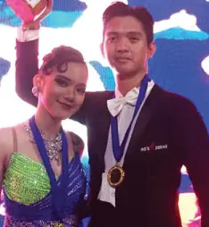  ??  ?? CHAMPION Ballroom Category Amateur A -Dave Torres and Roshua Daclan of Davao Doctors College