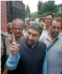  ?? AP ?? Separatist leader Mirwaiz Umar Farooq speaks to reporters before he was detained by police in Srinagar on Monday. —