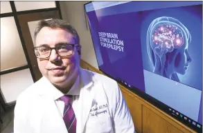  ?? Arnold Gold / Hearst Connecticu­t Media ?? Dr. Jason Gerrard, director of stereotact­ic and functional neurology in the Yale School of Medicine, photograph­ed on Nov. 26, will be using Medtronic’s deep-brain stimulatio­n therapy approved by the U.S. Food and Drug Administra­tion at Yale Haven Haven Hospital.