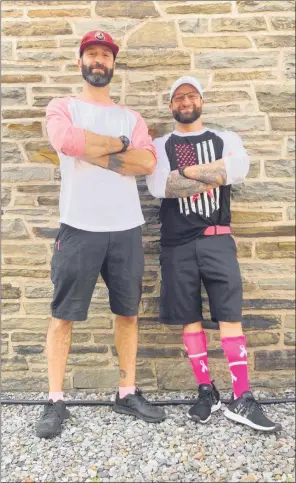  ?? SCRAP PAPER SOCIAL ?? From left to right: Colin and Tucker Ray of Ray Brothers Barbecue are going head- to- head to see who can raise more money via the Real Men Wear Pink campaign to fight against breast cancer.