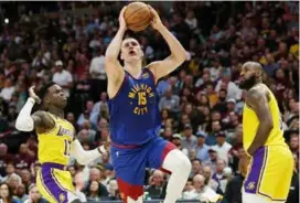  ?? AFP/VNA Photo ?? TOP FORM: Nikola Jokic dominated the Los Angeles Lakers to help the Denver Nuggets take a 1-0 lead in their Western Conference finals series.