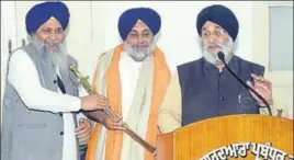  ??  ?? Shiromani Akali Dal president Sukhbir Singh Badal being honoured by SGPC president Gobind Singh Longowal at Teja Singh Samundri Hall in Amritsar on Monday. HT PHOTO