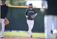  ?? ?? Brendan Rodgers (7) of the Colorado Rockies jogs off the field during MLB Spring Training at Salt River Fields.