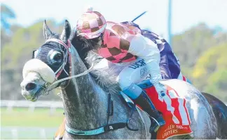  ?? Picture: AAP IMAGE/TRACKSIDE ?? Jockey Ruby Ride wins on Gilded Lion at Caloundra yesterday.