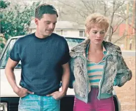  ?? Neon ?? TONYA HARDING (MARGOT ROBBIE) and her husband, Jeff Gillooly (Sebastian Stan), in Craig Gillespie’s brash ice skating drama “I, Tonya.”