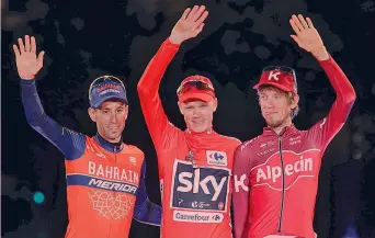  ??  ?? Il podio 2017: Vincenzo Nibali (2°), il britannico Chris Froome (vincitore) e il russo Ilnur Zakarin (3°) BETTINI