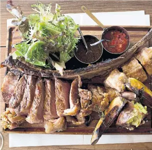  ?? ALEJANDRO KIRCHUK/THE NEW YORK TIMES ?? Beef served with vegetables at Piedra Infinita Restaurant in Familia Zuccardi cellar in Valle de Uco.