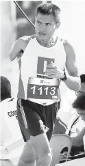  ?? (Rio Deluvio) ?? ARM-LESS RUNNER: Isidro Vildosola runs in the 10,000m Master's category.