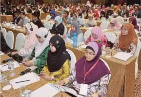  ??  ?? Participan­ts of the Internatio­nal Wasatiyyah Seminar 2017 at the Putrajaya Internatio­nal Convention Centre yesterday.