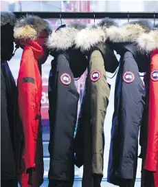  ?? CHRISTINNE MUSCHI/BLOOMBERG ?? Not long after Canada Goose parkas became a winter fashion hit, cheaper knockoffs started to appear.