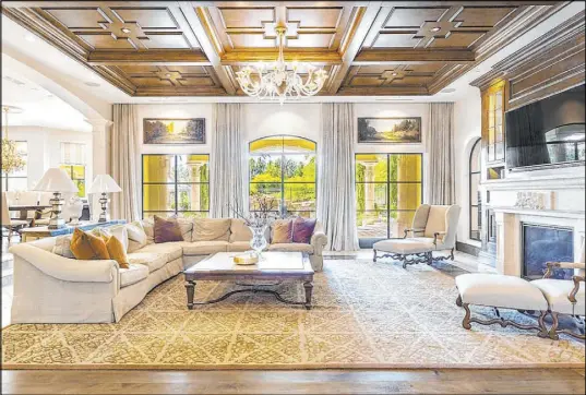  ?? Ivan Sher Group ?? The Tuscan-style home had nearly $20 million worth of remodeling work that included luxury finishes.