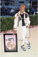  ?? FRAZER HARRISON/FILMMAGIC ?? Jaden Smith hit the Met Gala in New York this summer in style. Would his dad, Will, wear those shoes?