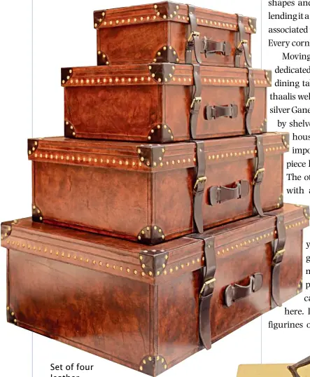  ??  ?? Set of four leather suitcases