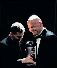  ?? FRANCK FIFE AFP ?? ARGENTINA and Paris Saint-Germain forward Lionel Messi receives the Best Fifa Men’s Player award from Fifa president Gianni Infantino during the Best Fifa Football Awards 2022 ceremony in Paris on Monday. |