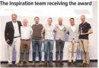  ??  ?? The Inspiratio­n team receiving the award