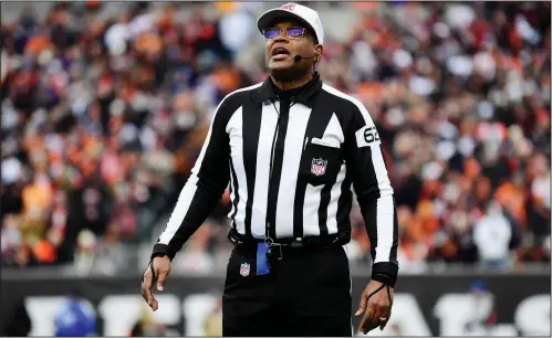  ?? (File Photo/ap/emilee Chinn) ?? Referee Ronald Torbert works Jan. 8 during an NFL football game between the Cincinnati Bengals and Baltimore Ravens in Cincinnati. Stories circulatin­g online incorrectl­y claim the NFL is investigat­ing Torbert because his son made a large wager on the Kansas City Chiefs before they defeated the Cincinnati Bengals on Jan. 29.