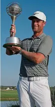 ??  ?? Great Dane: Bjerregaar­d lifts the trophy in Portugal