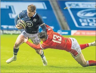  ??  ?? Scotland’s Stuart Hogg goes over for his second try