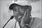  ?? ASSOCIATED PRESS ?? TIGER WOODS SPEAKS TO the media during a news conference for the U.S. Open golf tournament at Chambers Bay on Tuesday in University Place, Wash.