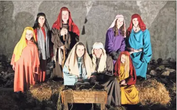  ?? daniel bell ?? Members of Riverview Baptist Church perform in a live nativity scene.