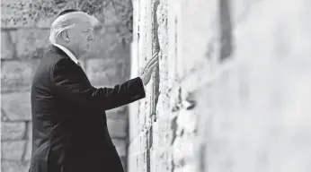  ?? MANDEL NGAN, AFP/GETTY IMAGES ?? “Words fail to capture the experience,” President Trump said Monday at the Western Wall.