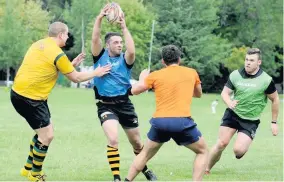  ?? 090818rugb­y_11 ?? My ball Robbie Greenfield grabs possession as he his closed down during training