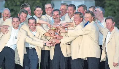  ??  ?? Sam Torrance celebrates with his team after victory over the USA at The Belfry in 2002