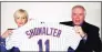  ?? Associated Press ?? This still image from video shows New York Mets manager Buck Showalter, right, holding up his team jersey with his wife Angela during a virtual press conference where he was introduced as the new manager on Tuesday in New York.