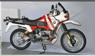  ??  ?? ABOVE RIGHT 1989 R100GS in Paris-Dakar livery. This was the final model with carbs before fuel injection, also with universal joint drive/ swing arm and convention­al forks rather than Telelever.