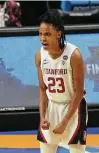  ??  ?? Stanford's Kiana Williams, a Wagner grad, reacts after a 3-pointer against Arizona on Sunday.