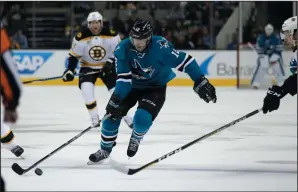  ?? NHAT V. MEYER/BAY AREA NEWS GROUP ?? San Jose Sharks' Patrick Marleau (12) skates with the puck against the Boston Bruins on Feb. 19, 2017 at the SAP Center in San Jose.